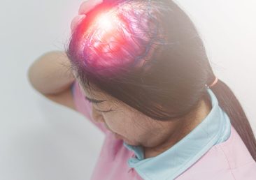 Close up older woman suffering from head pain, stroke concept, ischemic stroke, health problem and people concept.