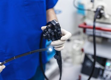 Endoscopy at the hospital. Doctor holding endoscope before gastroscopy. Medical examination