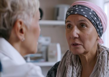 middle-aged-woman-with-skin-cancer-talking-with-her-doctor
