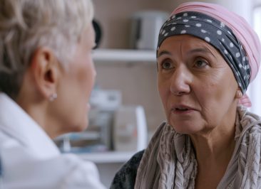 middle-aged-woman-with-skin-cancer-talking-with-her-doctor
